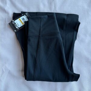 Under Armour Women's Motion Crossover Pants-Black-Sz S- Flare,side split Bottom